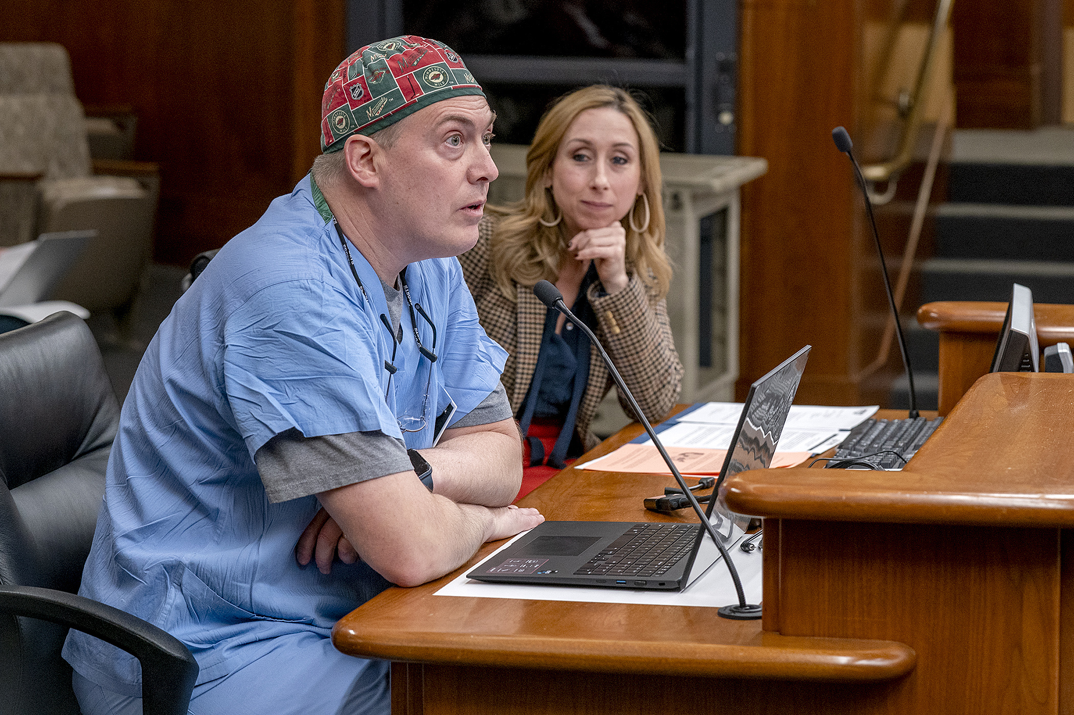 John Zender, a perioperative registered nurse, testifies Feb. 29 about the dangers of surgical smoke. Rep. Kaela Berg sponsors HF4011 to require use of smoke evacuation systems during procedures that produce surgical smoke. (Photo by Michele Jokinen)